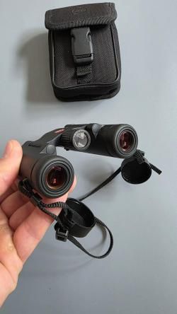 Бинокль Swarovski CL POCKET 10x25 и Бинокль Leica Ultravid 8x20 BR black