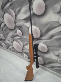 Crosman oprimus с оптикой Leapers