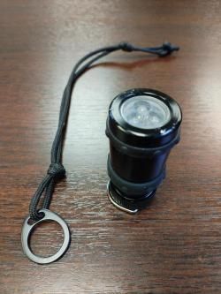 Фонарь BL-01 и кольцо для крепления темляка для телескопической дубинки ESP