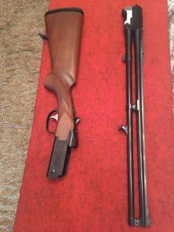 Карабин TIKKA с тремя комбинированными стволами.