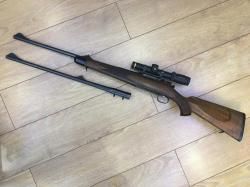 Mauser M03  9,3х62 .сменный ствол .223Rem с оптикой LEUPOLD 1х6
