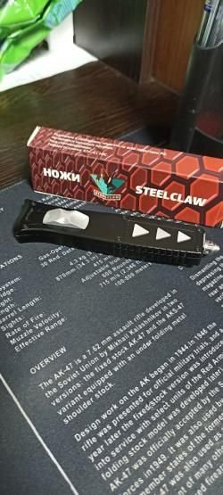 Нож автоматический