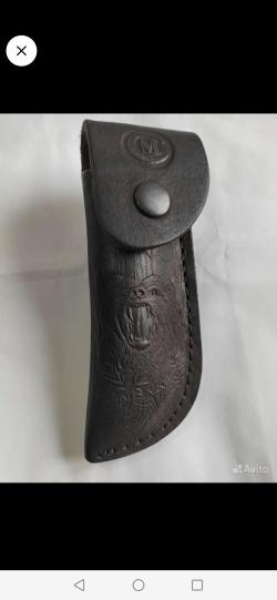 Нож складник с клинком из дамасской стали.