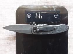 Нож складной со звериным барельефом новый