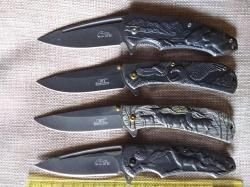 Нож складной со звериным барельефом новый
