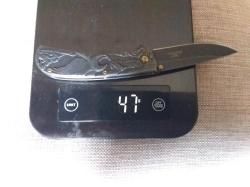 Нож складной со звериным барельефом новый