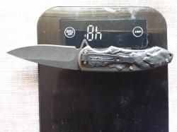 Нож складной со звериным барельефом новый