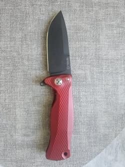 Нож