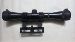 Оптический прицел с кольцами.