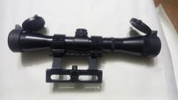 Оптический прицел с кольцами.