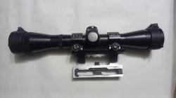 Оптический прицел с кольцами.