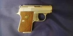 Пистолет Colt 25