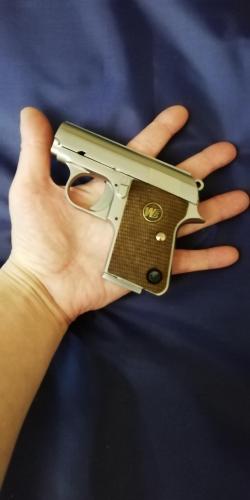 Пистолет Colt 25