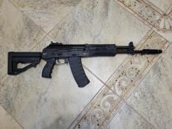 СХ-АК12