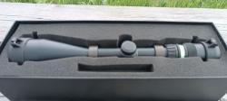 Trijicon AccuPoint TR22-2G (2.5-10x56, Mil-Dot Green) на стальных кольцах Trijicon 