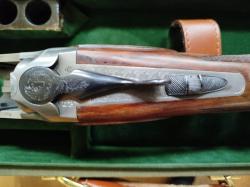 Универсальное испанское ружьё 12 кали⁰бра для охоты и стендовой стрельбы со съемными чоками и дополнительным стволом