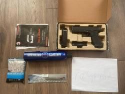 WE Glock 17 + кит Poseidon (Ice Peak + стволик)