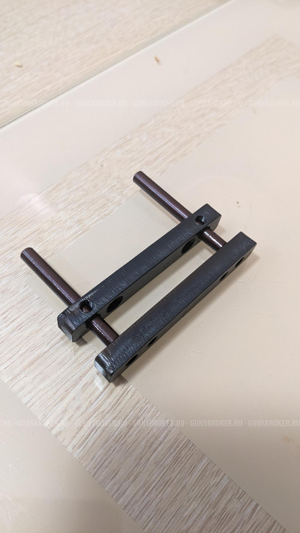 Механизм регулировки гребня приклада