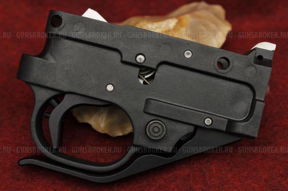 На RUGER 10/22 - рукоятки перезарядки, магазин релиз, ударник, экстрактор, авто болт релиз