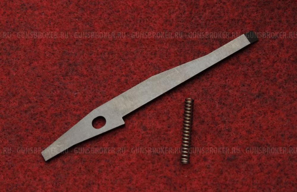 На RUGER 10/22 - рукоятки перезарядки, магазин релиз, ударник, экстрактор, авто болт релиз