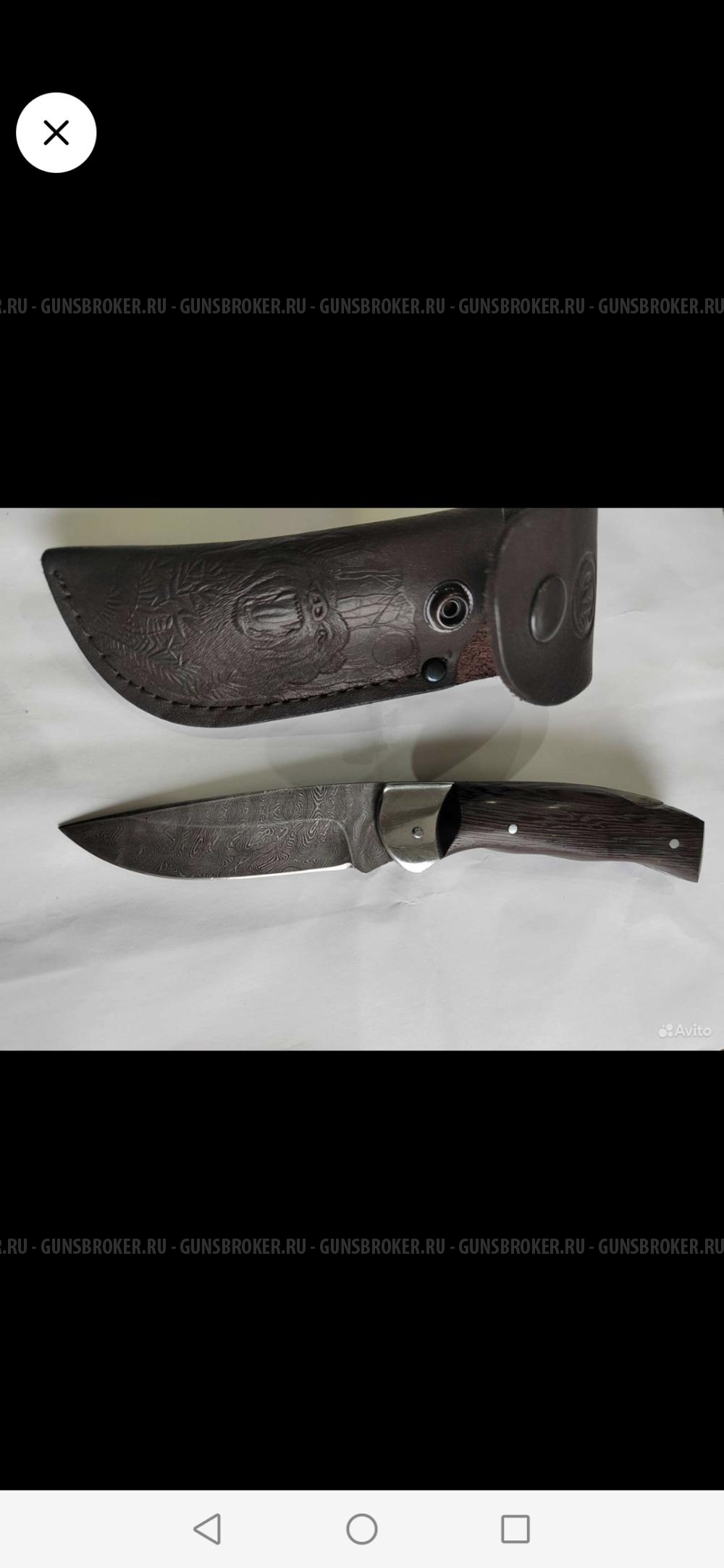 Нож складник с клинком из дамасской стали.