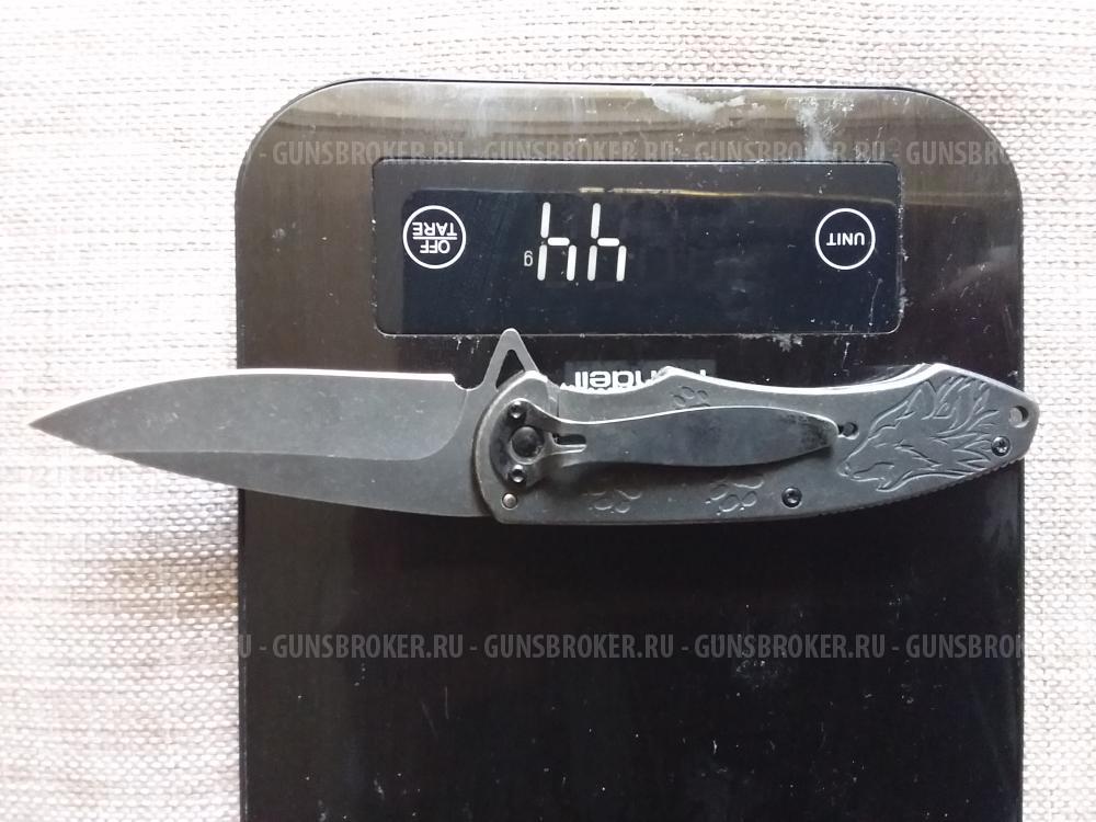 Нож складной со звериным барельефом новый