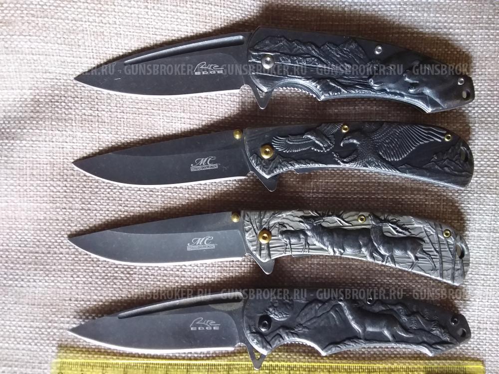 Нож складной со звериным барельефом новый