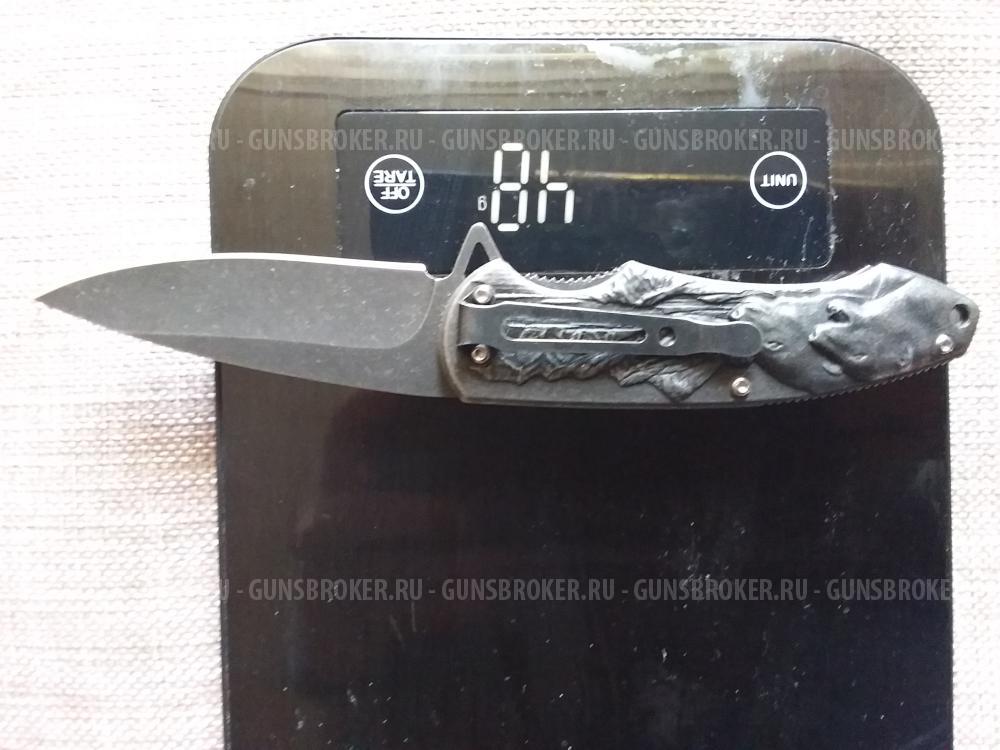 Нож складной со звериным барельефом новый
