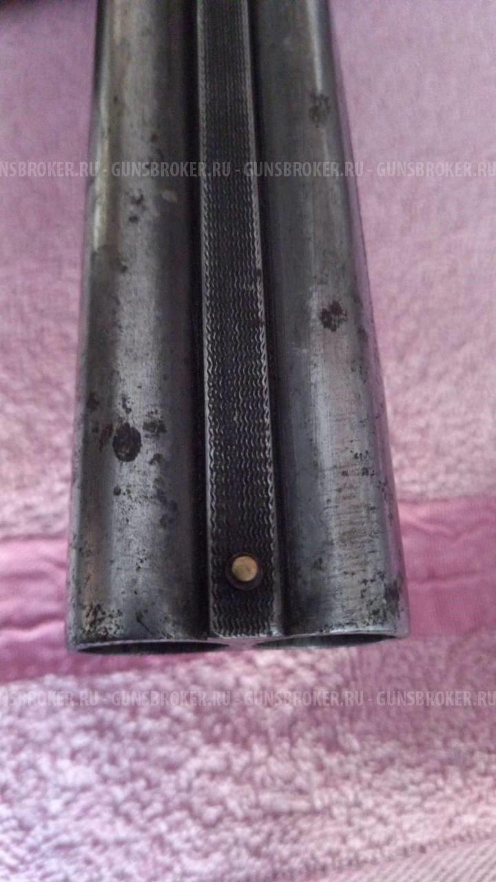 Охотничье огнестрельное гладкоствольное оружие марки ИЖ-43М