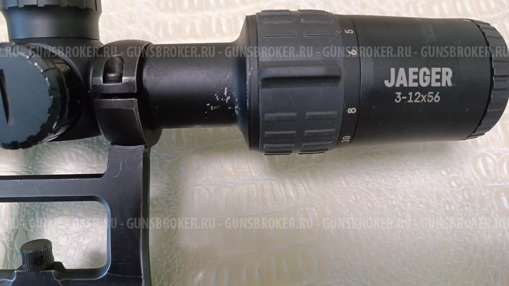 Оптический прицел переменной кратности с подсветкой, с кронштейном.Jager 3-12X56 