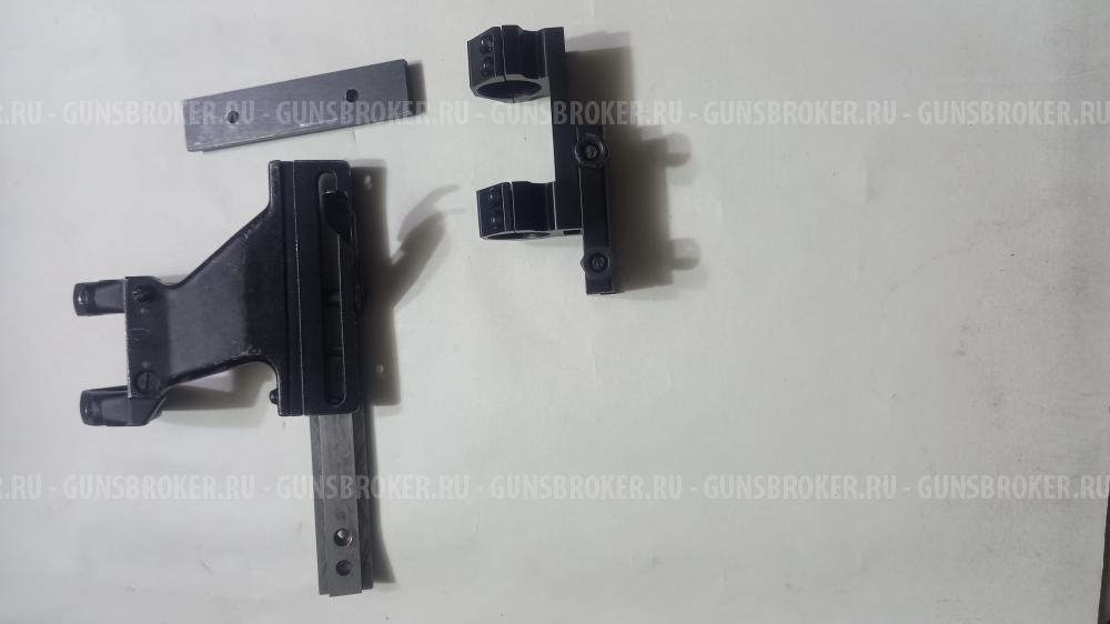 Оптический прицел с кольцами.