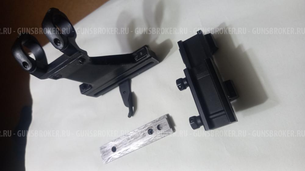 Оптический прицел с кольцами.