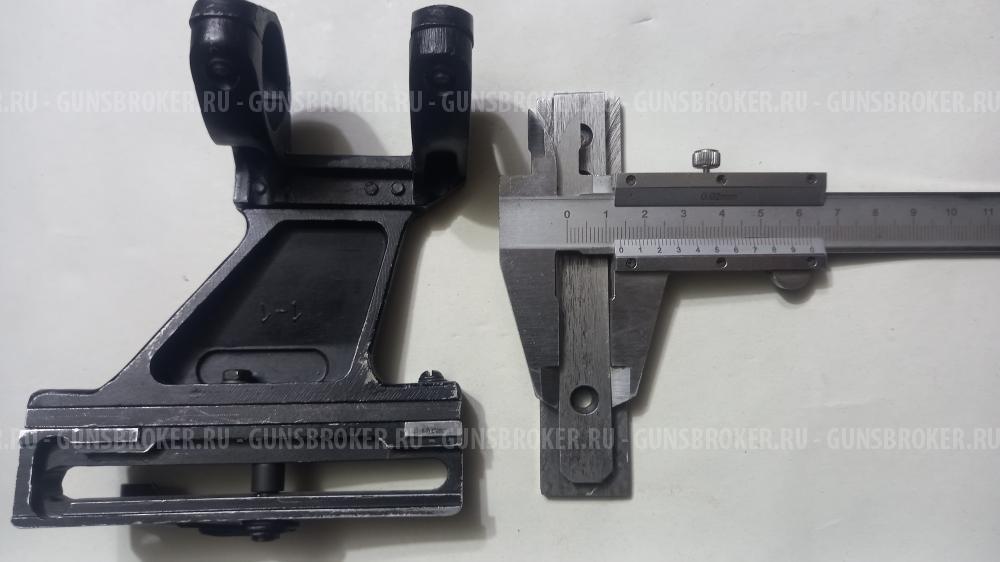 Оптический прицел с кольцами.