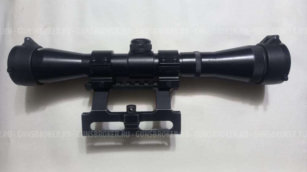 Оптический прицел с кольцами.