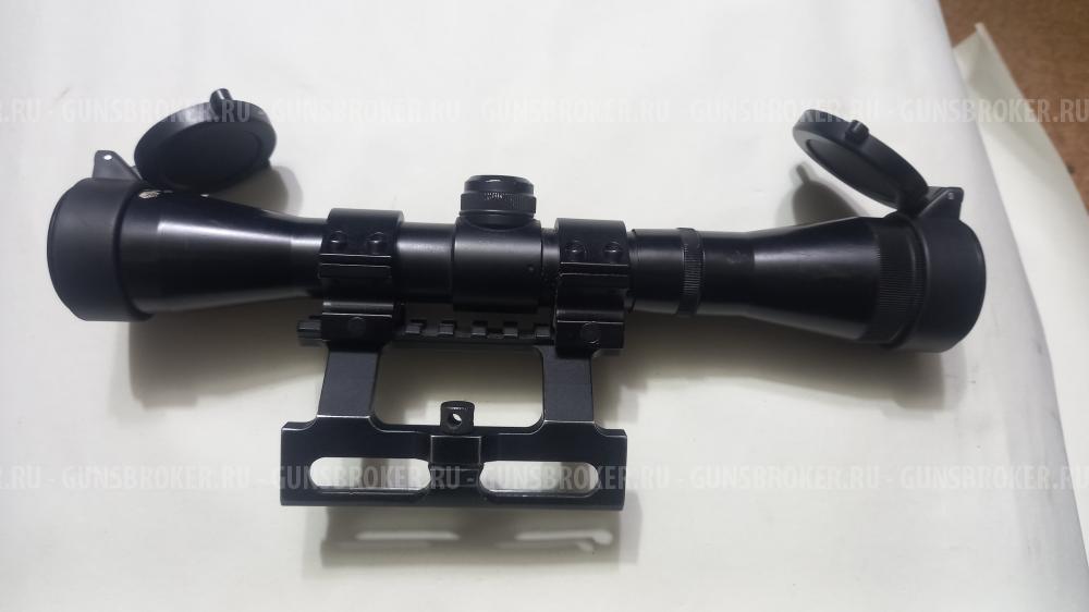 Оптический прицел с кольцами.