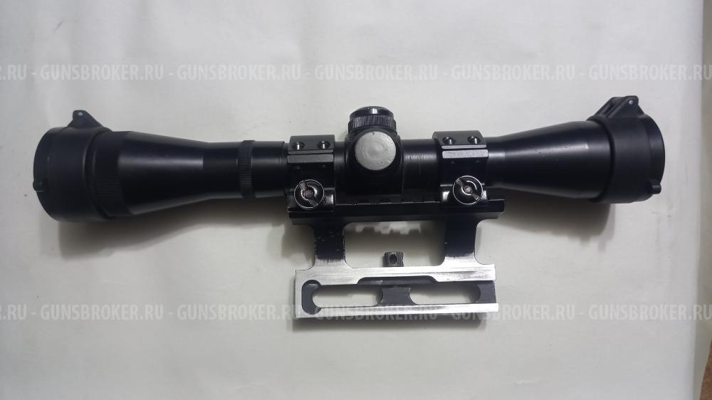 Оптический прицел с кольцами.