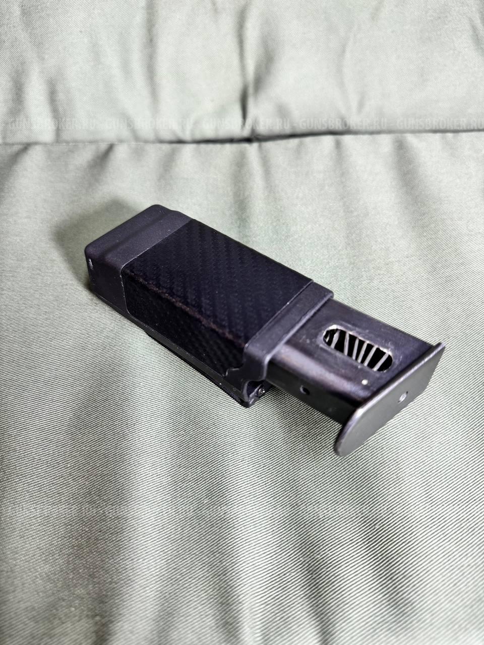 Паучер Blackhawk под пистолетный магазин