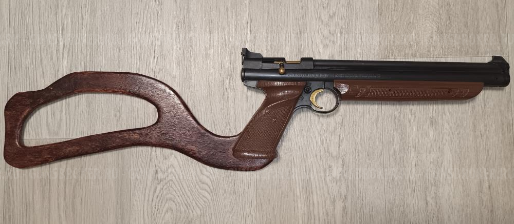 Мультикомпрессионный  пневматический пистолет Crosman 1377 c прикладом.