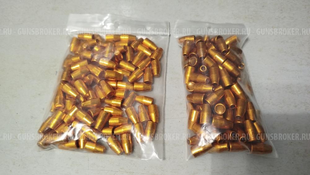 Пистолетные пули 9мм.