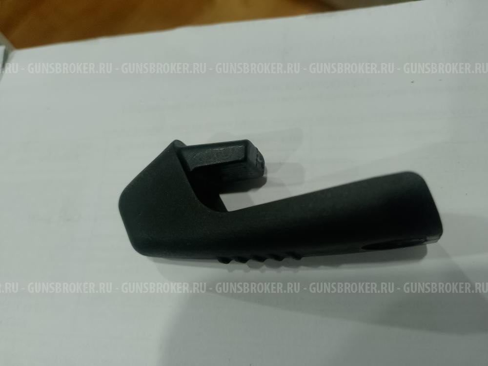 Заглушка пистолетной ручки .